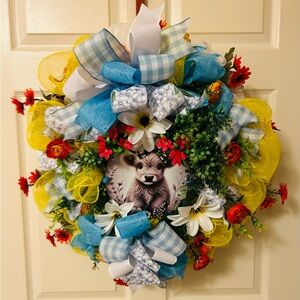 Floral cow-Themed Wreath with Yellow and Blue Accents